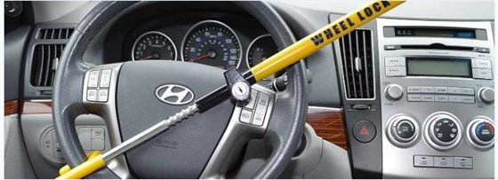A Hyundai vehicle with a steering wheel lock.