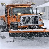 A Roseville snow plow on a winter morning.