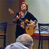 A musician performs at Open Mic Night.