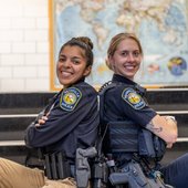 Officers Alaina Carrion and Liz Peterson pose for first day of school photos as Roseville's newest School Resource Officers.