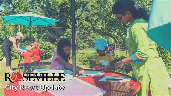Children make prints with apples and other fruit at Plant! Harvest! Taste! class at Muriel Sahlin Arboretum orchard.