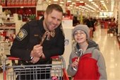 Lt. Adams and partner at Shop with a Cop
