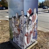 Local artists paint utility boxes on Rice Street.