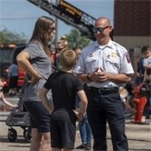 Chief Brosnahan talks with members of the community