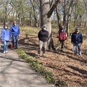 Volunteers pose for a picture at Reservoir Woods.
