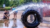 Fridays with Firefighters - aiming for a tire with a truck hose