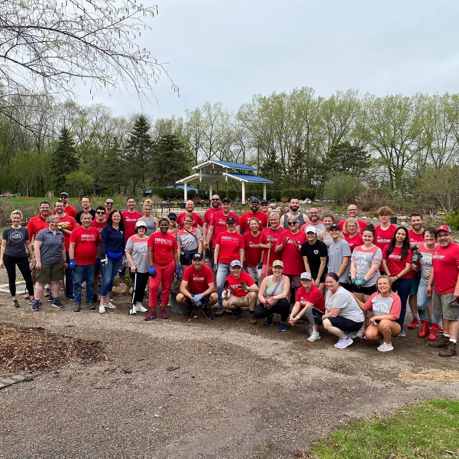 keller-williams-volunteers-group photo outside muriel sahlin arboretum
