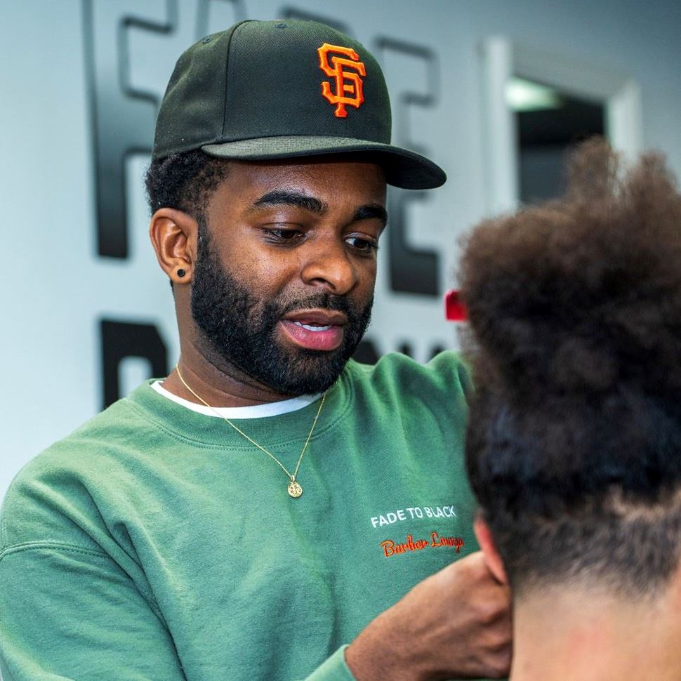 Mike Black, owner of Fade to Black Barber Lounge.