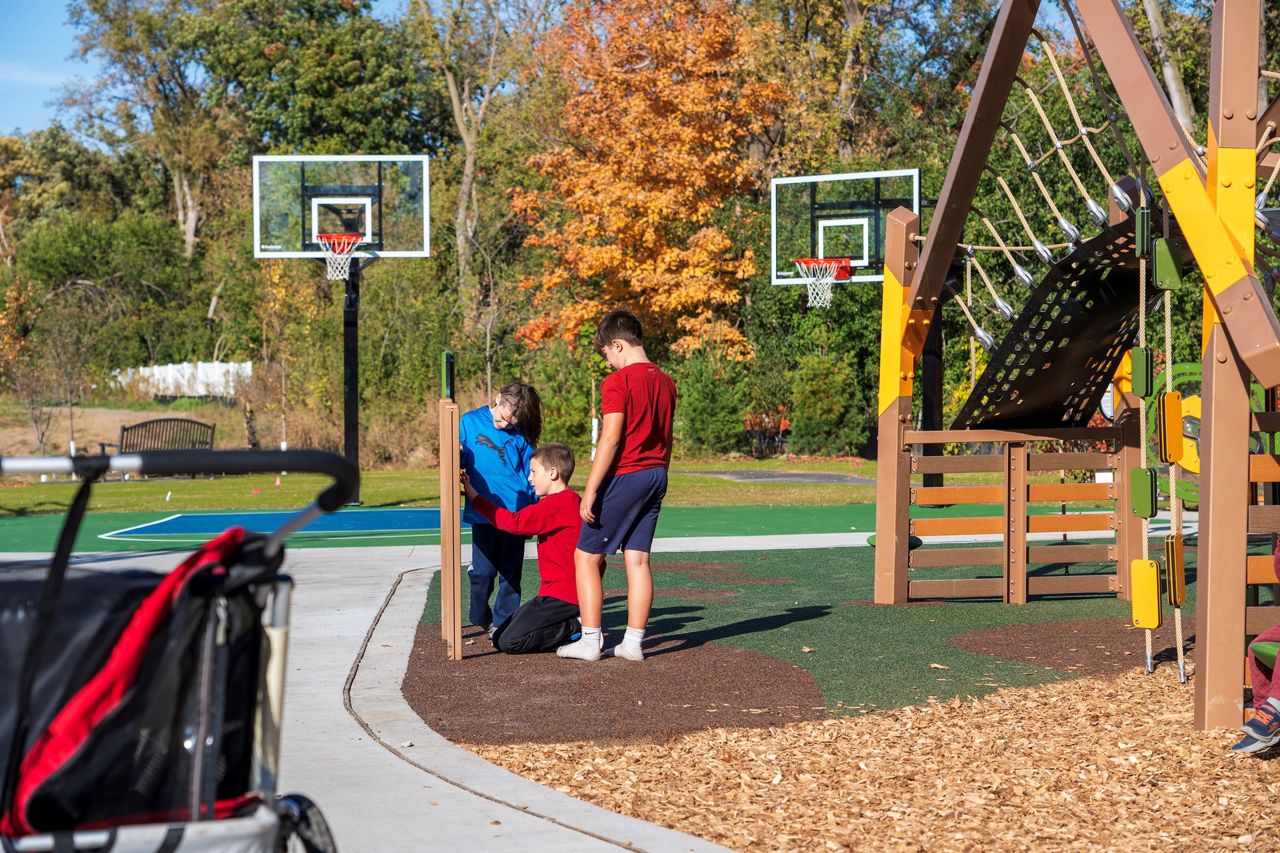 Kids playing on the playground at Sunset Park.