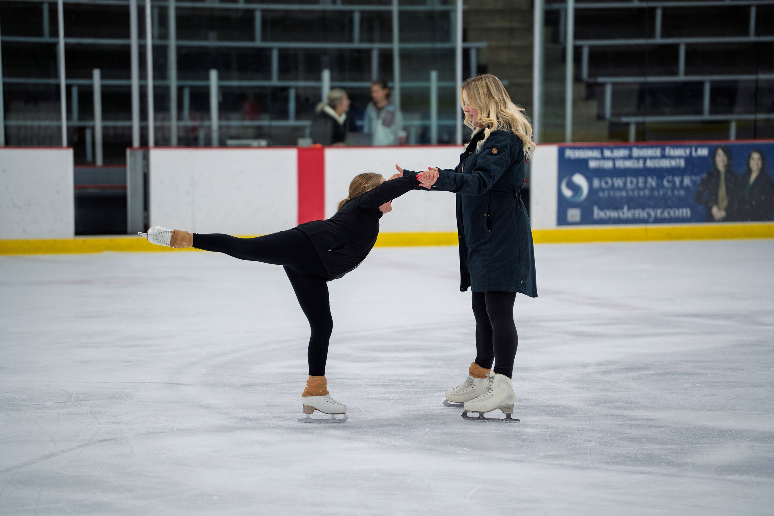 Vanessa Anderson teaches ice skating to her daughter at the Roseville ice arena.